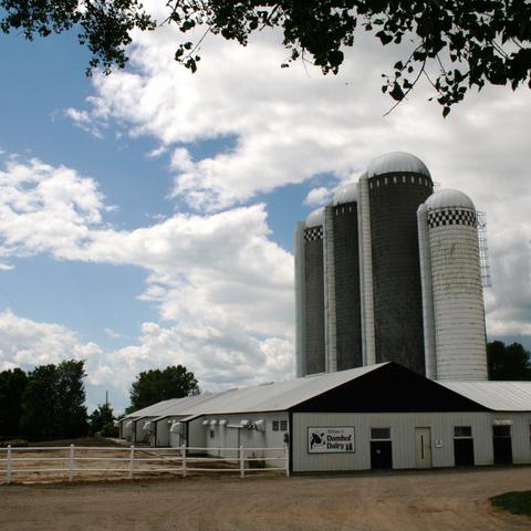 The barn and silos on the family farm