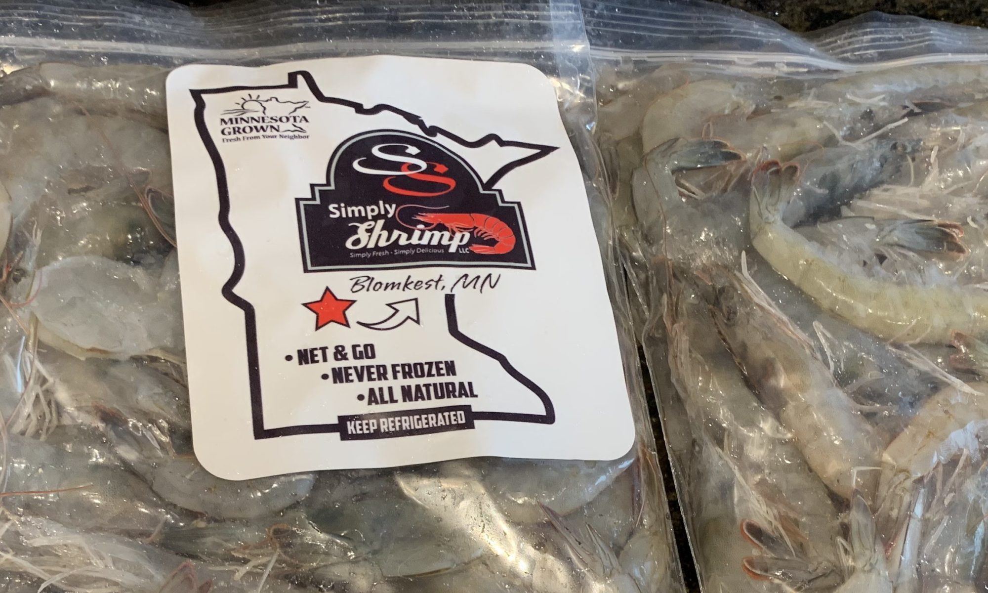 Bags of fresh Simply Shrimp with the Minnesota Grown label